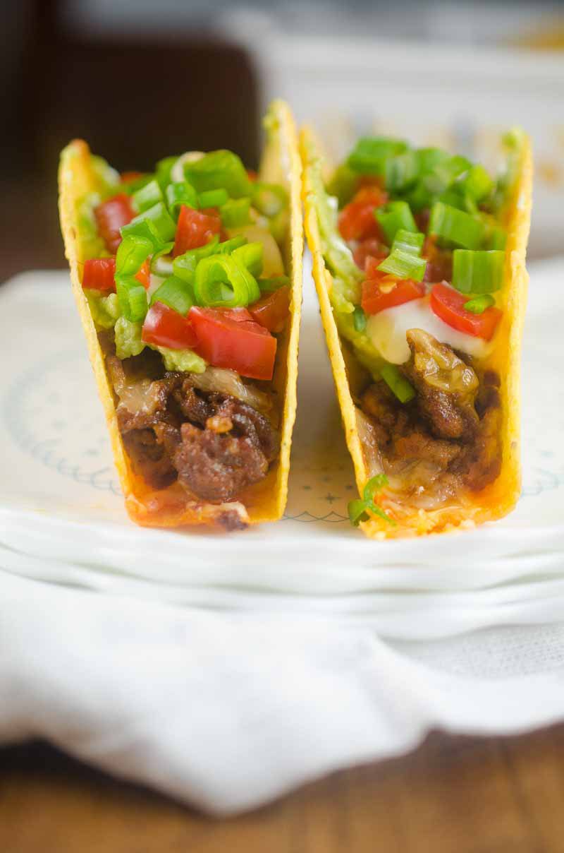 Everyone's favorite party dip turned into a taco! These 7 Layer Baked Chorizo Tacos will be a hit with the whole family!