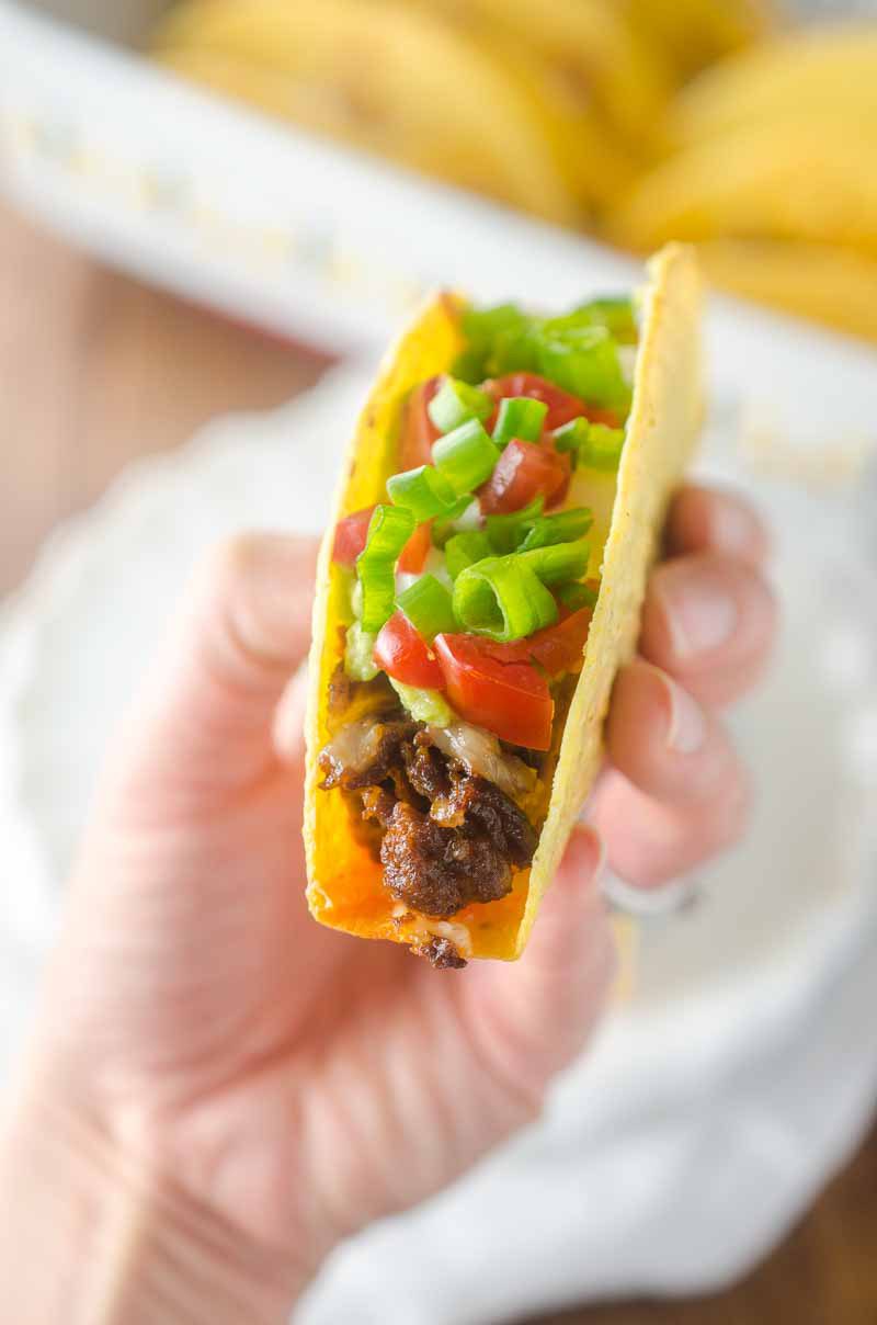 Everyone's favorite party dip turned into a taco! These 7 Layer Baked Chorizo Tacos will be a hit with the whole family!
