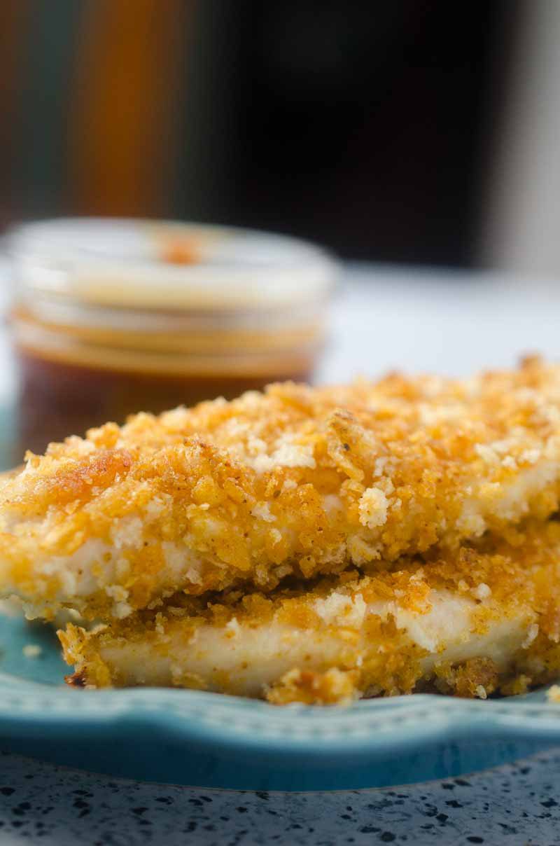 BBQ Chip Crusted Chicken Tenders are chicken tenderloins crusted in BBQ chips and baked until crispy. The perfect kid food!