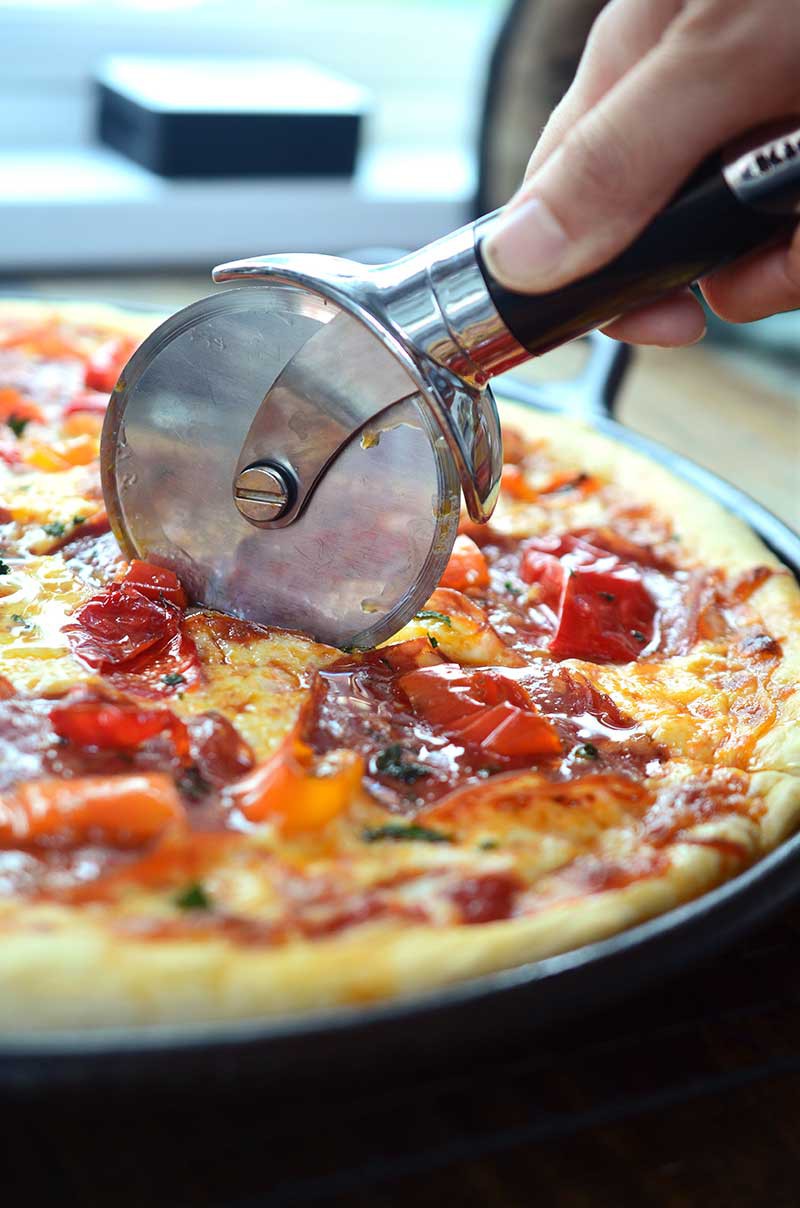 This Calabrese Honey Pizza is the perfect combo of sweet n' spicy with plenty of mozzarella, spicy calabrese, Mama Lil's peppers and a drizzle of honey.