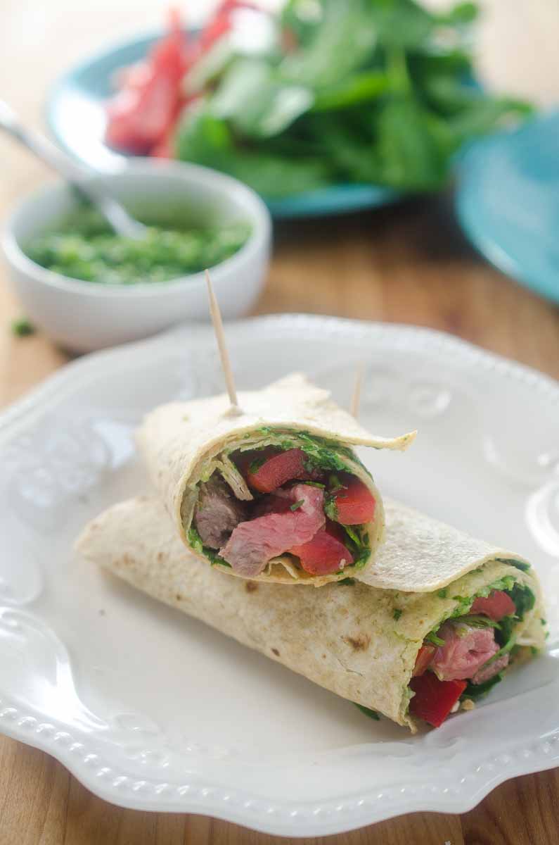 Chimichurri Steak Wraps make a great lunch or dinner! An easy chimichurri sauce adds big flavor to wraps made with steak, spinach and red bell pepper.