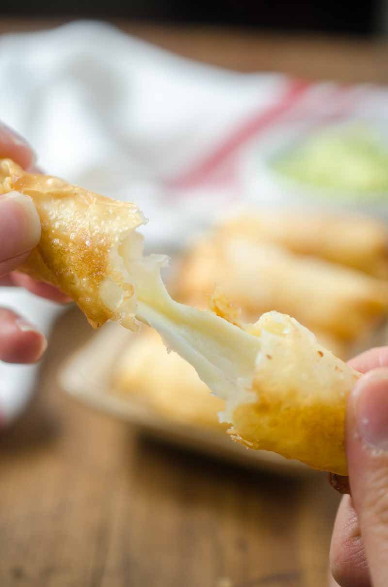 Fried Pepper Jack Cheese Sticks are a must for any game day! Spicy pepper jack cheese, wrapped in a wonton wrapper and fried until melted and golden. 