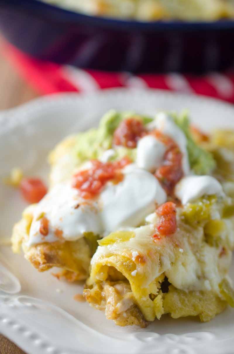 Green Chile Chicken Enchiladas are loaded with chicken, chiles and 3 kinds of cheese. They are perfect way to use leftover chicken.