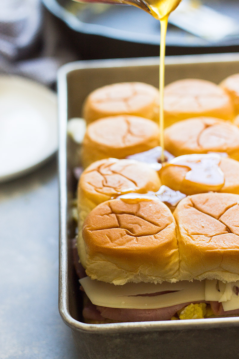 Breakfast sliders are an easy brunch or breakfast idea that everyone seems to love! This Ham and Swiss Breakfast Sliders recipe is kid-friendly, delicious and makes a quick breakfast!