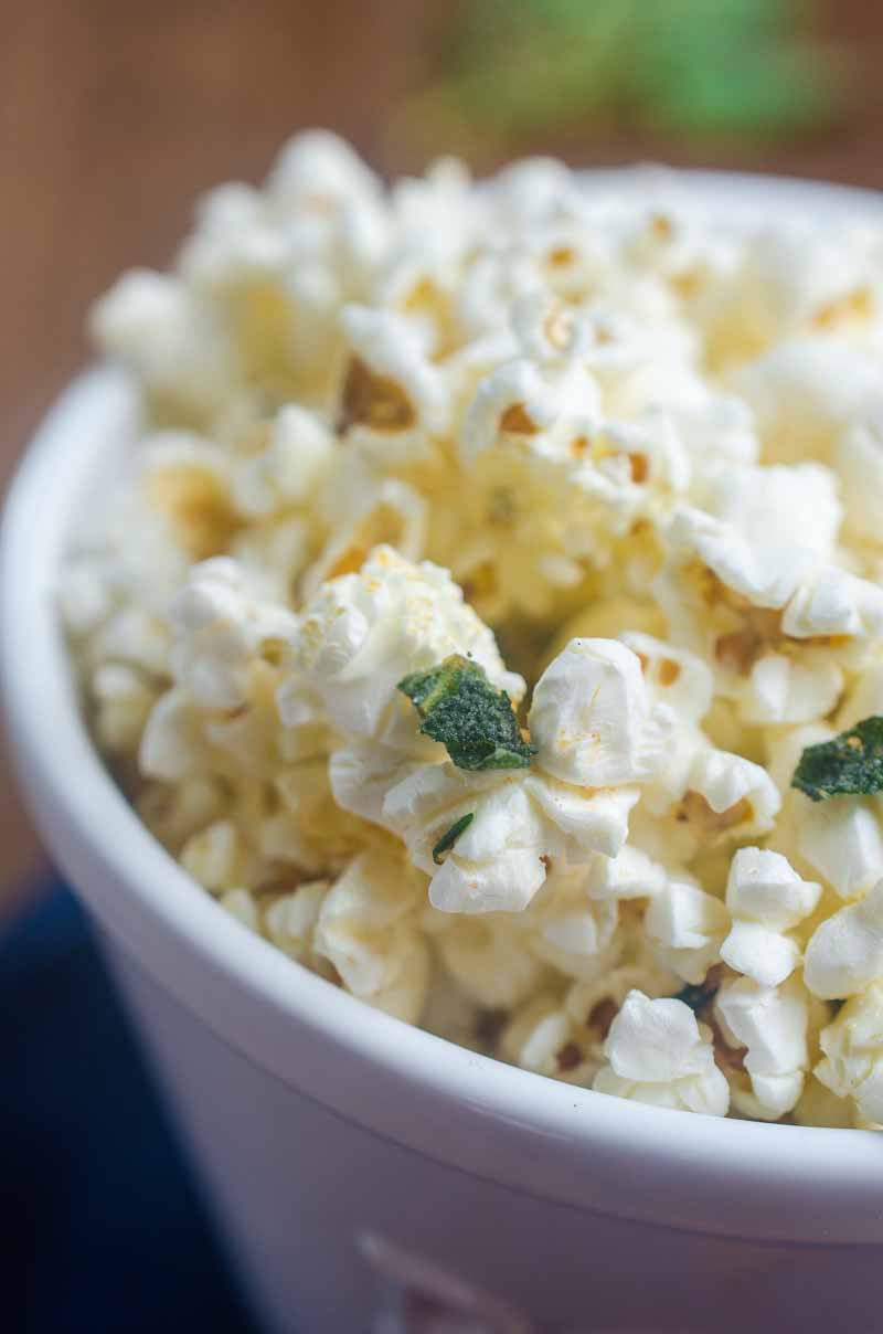 Want to jazz up everyone's favorite movie snack? Butter fried sage and thyme make this Herb Butter Popcorn perfect for movie night. 