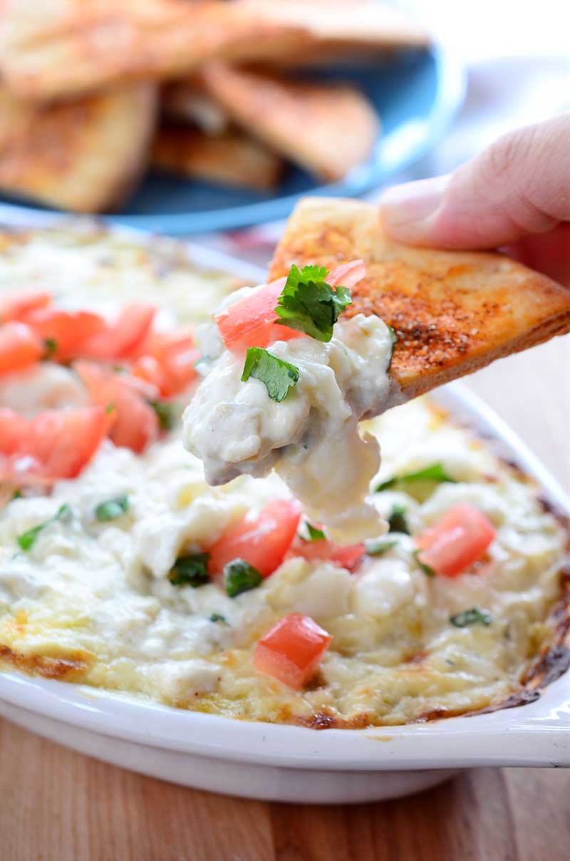 Hot Green Chile Cheese Dip. Cream cheese, pepper jack cheese, queso fresco, sour cream and green chiles baked until hot and bubbly. The perfect party dip!