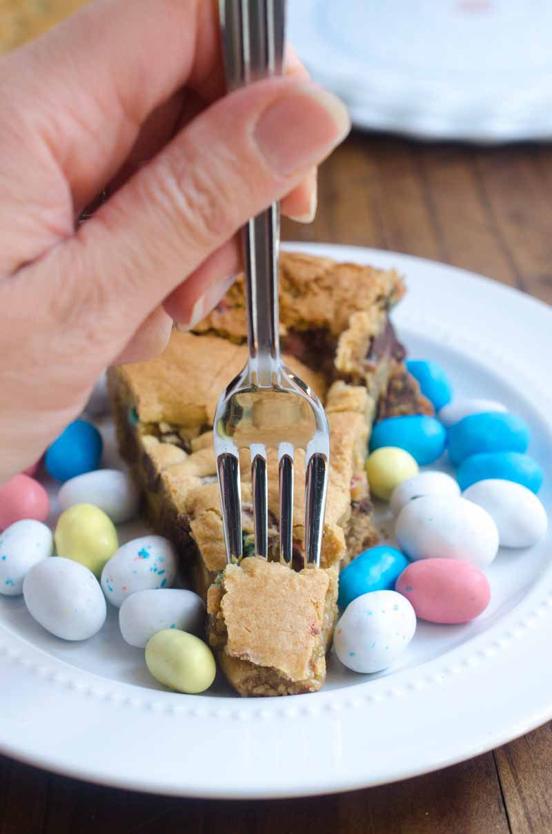 What's better than Easter candy? A big ol' Easter Candy Skillet Cookie! This Easter Skillet Cookie is loaded with chocolate chips, malted milk and malted robin eggs.