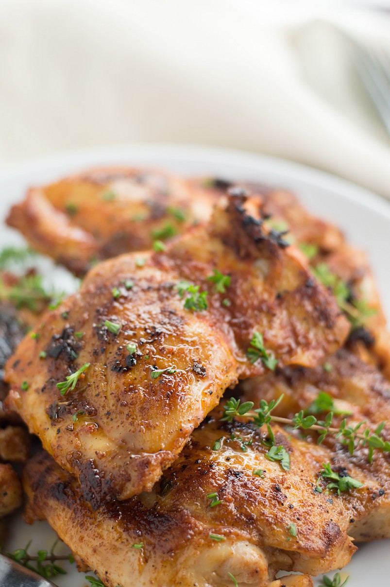 Smoky and Spicy Paprika Grilled Chicken. Juicy chicken thighs marinated with garlic, paprika, thyme and lemon then grilled to perfection.