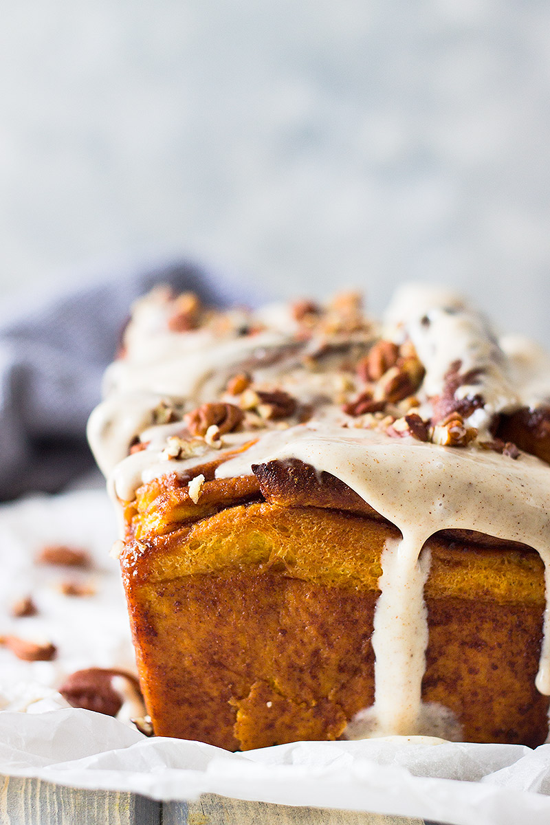 This Pumpkin Pull Apart Bread is a sweet pumpkin dough layered with cinnamon sugary goodness then topped with a pumpkin spice cream cheese frosting!!!