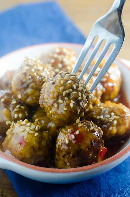 Sweet Chili Meatballs are so delicious, you'll need to make a double batch! This super easy slow cooker meatballs recipe is perfect for a weeknight dinner.