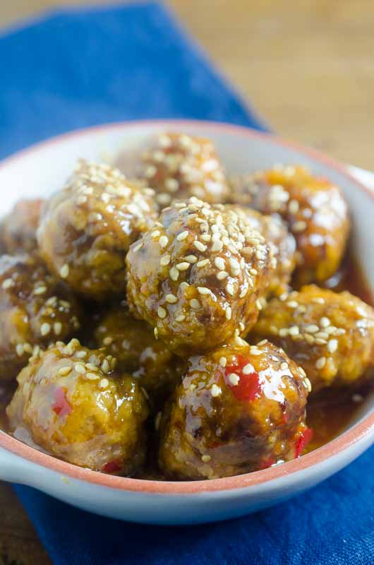 Sweet Chili Meatballs are so delicious, you'll need to make a double batch! This super easy slow cooker meatballs recipe is perfect for a weeknight dinner.