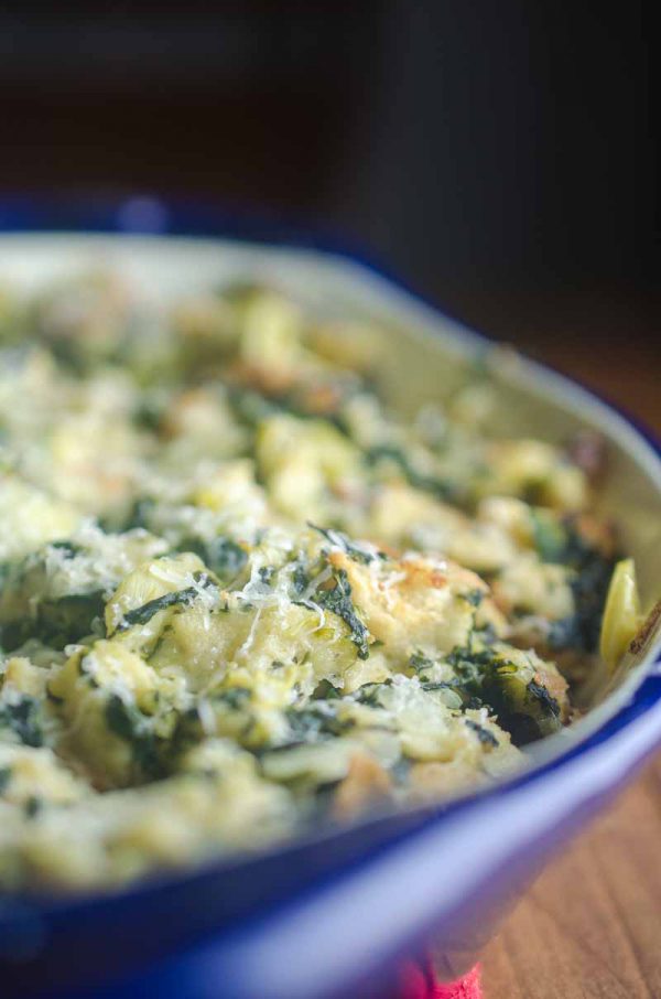 Spinach Artichoke Stuffing is a mashup of everyone's favorite party dip and everyone's favorite Thanksgiving side. It's loaded with spinach, artichokes and parmesan cheese. It's a must for your holiday table!