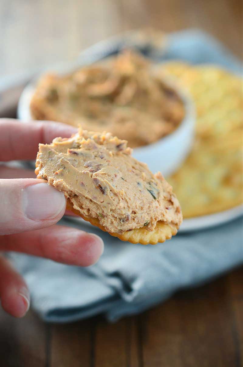 With only 4 ingredients and 5 minutes prep time, Sun-Dried Tomato and Goat Cheese Spread is the perfect holiday appetizer! 