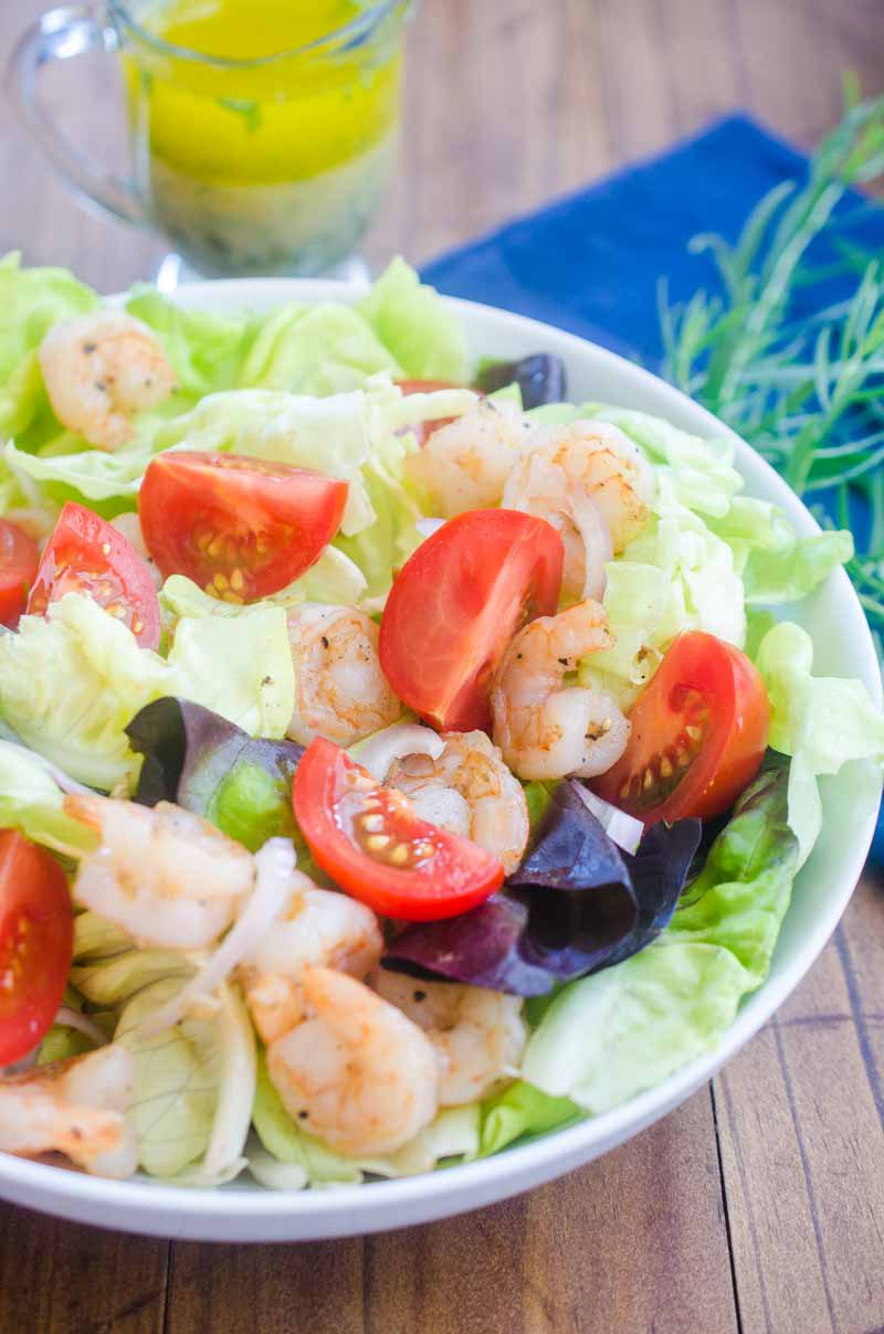 Tarragon Shrimp Salad is loaded with tender butter lettuce, shrimp, tomatoes and shallots tossed in a tarragon vinaigrette. It's a perfect summer lunch!