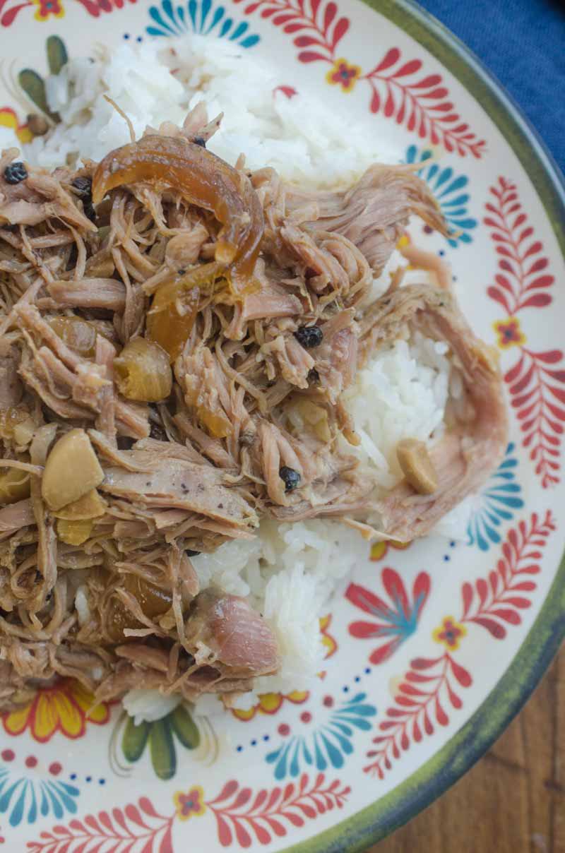 Slow cooker pork adobo is a traditional Filipino dish of pork, soy sauce, vinegar, peppercorns and bay leaves. Cooked to perfection in the slow cooker. 