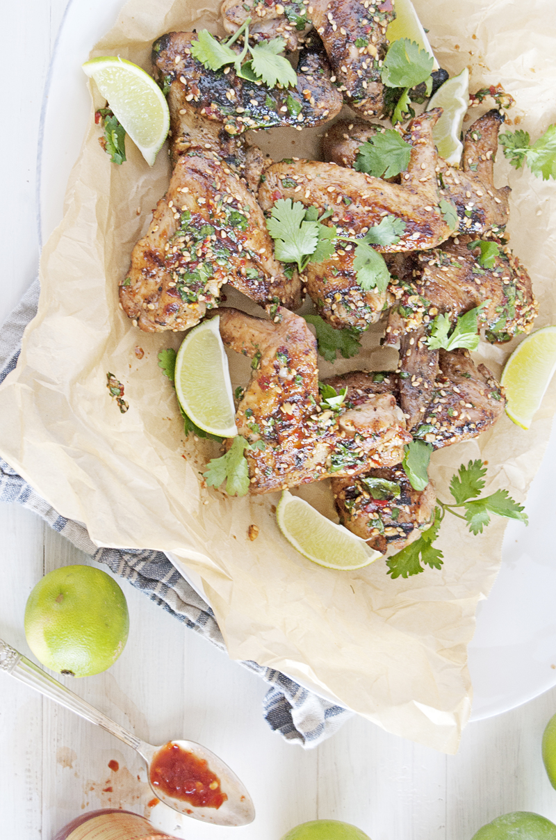 These Thai chicken wings are perfect for those warm summer grilling nights, and feature a beautifully spicy Thai sauce and lots of fresh cilantro!