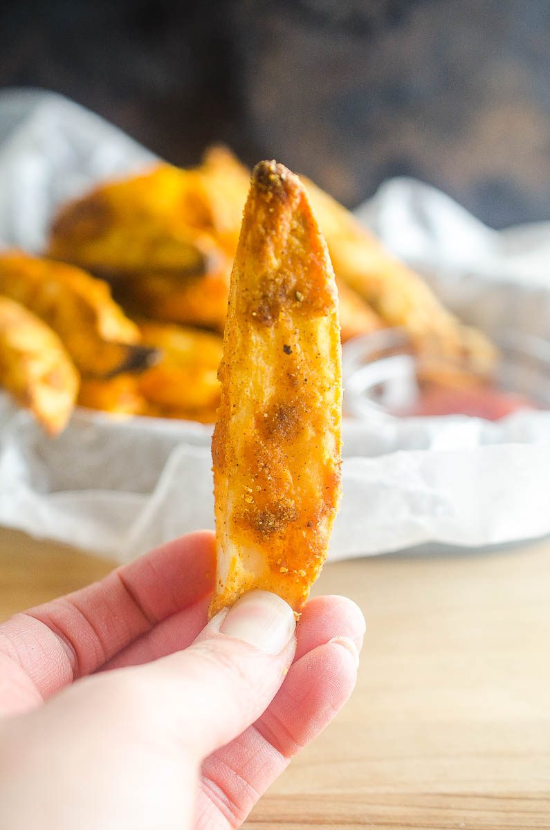 Potato wedges, or Jo Jo Potatoes as I like to call them, are perfectly seasoned and baked until golden.  Crispy on the outside and fluffy on the inside. They will be a hit with your whole family. 