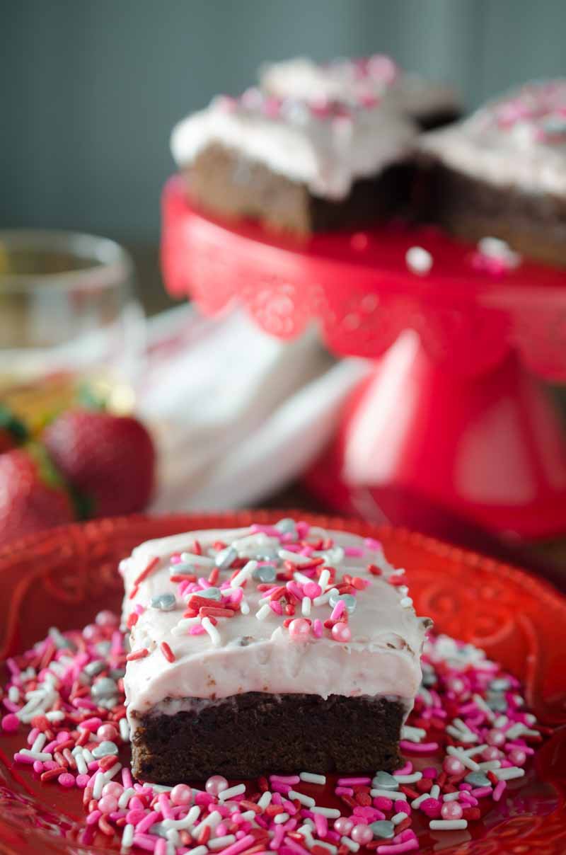 Decadent Strawberry Amaretto Brownies. A thick fudgy brownie topped with a delectable strawberry cream cheese frosting. 