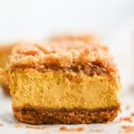 Close up of pumpkin cheesecake bar.
