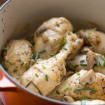 Mushroom chive chicken in soup pot.