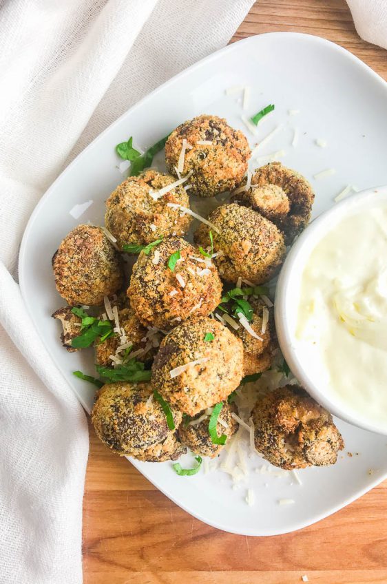 Crispy breaded air fryer mushrooms are lighter than traditional fried mushrooms and ready in under 10 minutes! Easy, delicious and perfect for game day!