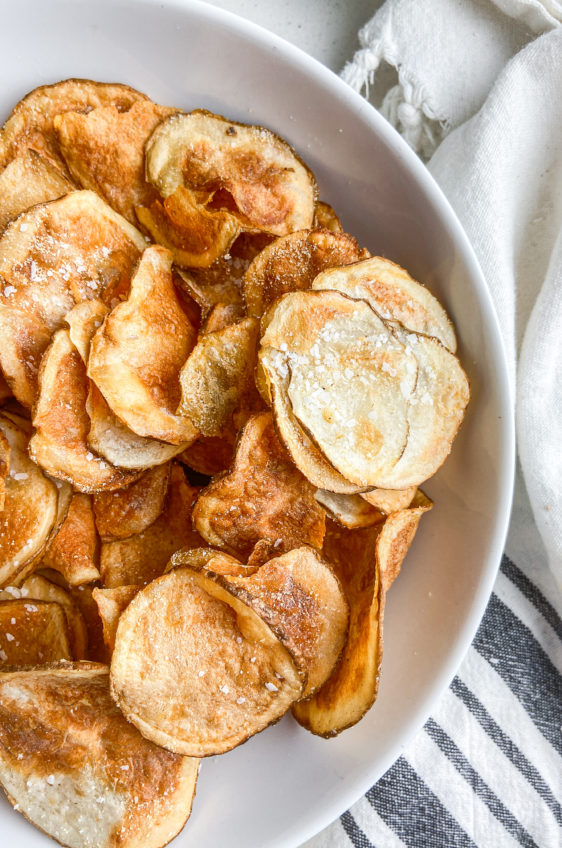 Overhead photo of a bowl of air fried potato chips.