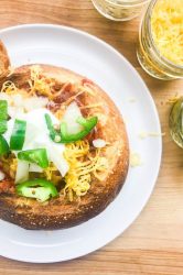 BBQ Rib Chili Bread Bowls, with all of your favorite toppings, are a hearty meal to serve on cool days. They are a must for game day parties too! 