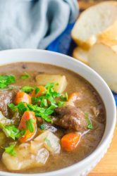 Beef Stew with Red wine is a hearty stew full of tender fall apart beef, vegetables, beef broth and red wine. It's the perfect cold weather comfort food!