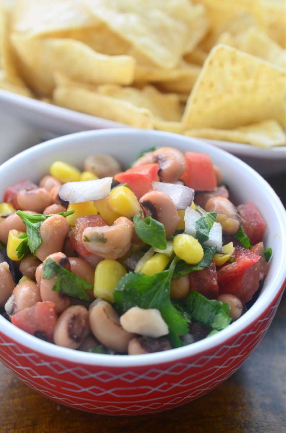 Loaded with black eyed peas, corn, tomatoes, onions, jalapeños, cilantro and lime, black eyed pea salsa is the perfect easy dip recipe to bring a bit of sunshine into your day.