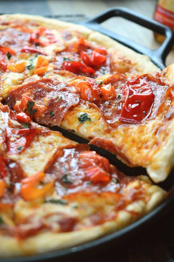 This Calabrese Honey Pizza is the perfect combo of sweet n' spicy with plenty of mozzarella, spicy calabrese, Mama Lil's peppers and a drizzle of honey.