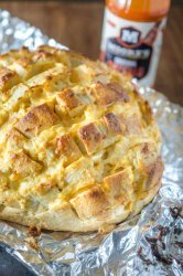 #ad This Cheesy Buffalo Pull-Apart Bread loaded with 3 cheeses, chicken and Moore's Original Buffalo Sauce, is perfect for all of your game day shenanigans!