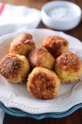 Cheesy Roasted Garlic Potato balls are basically the best way to use up holiday leftovers. Ever.