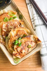 Chicken potstickers, whether they are pan fried potstickers or deep fried, are the most delicious Asian appetizer. Trust me, this simple chicken potstickers recipe will become your favorite!