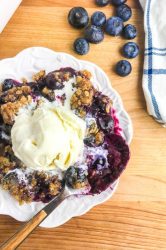 Savoring summer's sweet berries with this Easy Blueberry Crisp. Sweet blueberries topped with a sugary crust and baked until golden and bubbly. 