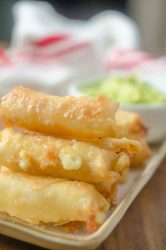Fried Pepper Jack Cheese Sticks are a must for any game day! Spicy pepper jack cheese, wrapped in a wonton wrapper and fried until melted and golden.