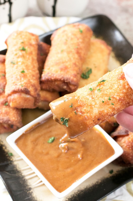 Crispy fried shrimp egg rolls loaded with shrimp, veggies and dipped in a spicy peanut sauce.