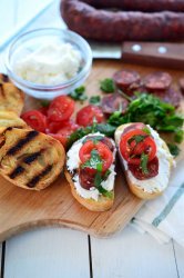 If you are looking for the perfect quick and easy appetizer for summer parties this Goat Cheese and Chorizo Crostini is it.