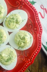 Herbed Deviled Eggs are an herby twist on a classic. With chives, dill and sour cream the creamy filling makes these irresistible. 