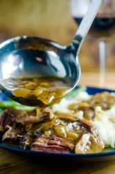 This Pressure Cooker Pot Roast is tender, fall apart, beefy goodness. It even makes it's own gravy! AND it's easy and quick enough to make any day of the week. 