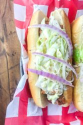 Take your summer hot dogs to the next level with Pulled Pork Hot Dogs. Hot dogs loaded with pulled pork, creamy coleslaw and red onion.