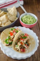 These Pulled Pork Tacos with Chipotle Slaw are packed full of flavor and a great addition to your Taco Tuesday!