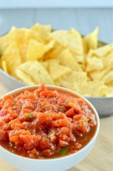 A quick, easy and spicy restaurant style habanero salsa.