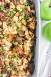 Sausage Apple Stuffing with brie in a baking dish