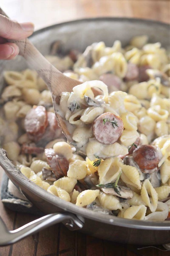 Dinner doesn't get more comforting than this Sausage and Mushroom Mac n' Cheese. This pasta is loaded with smoky sausage, mushrooms, swiss cheese and thyme. It's the perfect fall dinner!