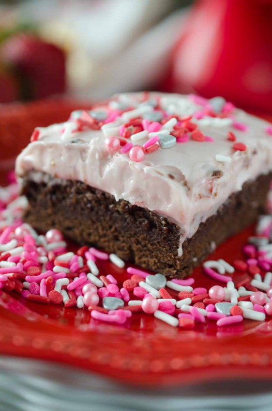 Decadent Strawberry Amaretto Brownies. A thick fudgy brownie topped with a delectable strawberry cream cheese frosting.