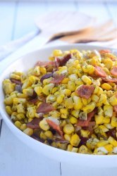 This 5 ingredient warm corn salad is loaded with sweet corn, dill, bacon, shallots and goat cheese. It's the perfect way to showcase summer corn.