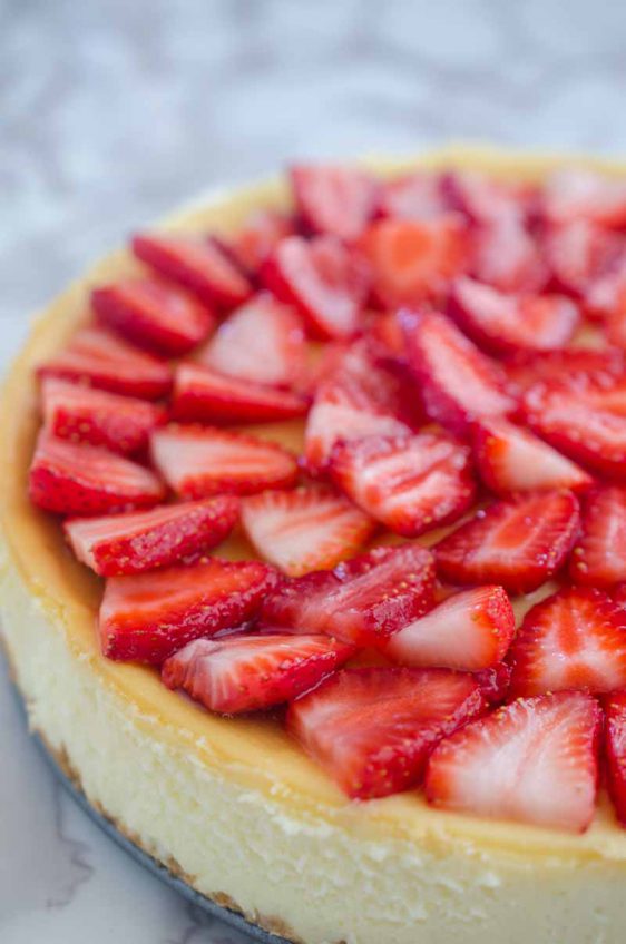 White chocolate strawberry cheesecake is the perfect cheesecake recipe for strawberry lovers! Get my tips for baking the perfect cheesecake and enjoy this decadent strawberry cheesecake recipe!