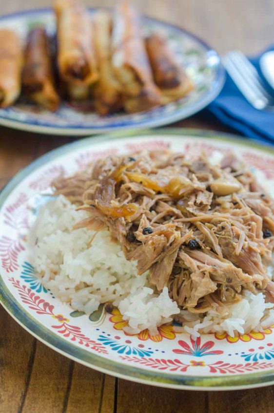 Slow cooker pork adobo is a traditional Filipino dish of pork, soy sauce, vinegar, peppercorns and bay leaves. Cooked to perfection in the slow cooker.