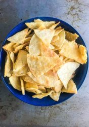 All you need to make your own homemade tortilla chips is 3 ingredients and 15 minutes in the oven. They are great for dipping in all the things! 