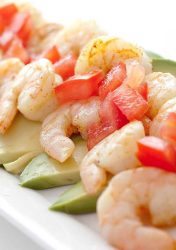 Adobo Shrimp on a bed of sliced avocado, topped with tomatoes and a squirt of lime. Quick, easy and a reminder that summer is just around the corner. 